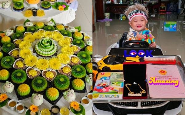 Nghi thức bốc đồ trong lễ cúng thôi nôi bé trai để dự đoán tương lai