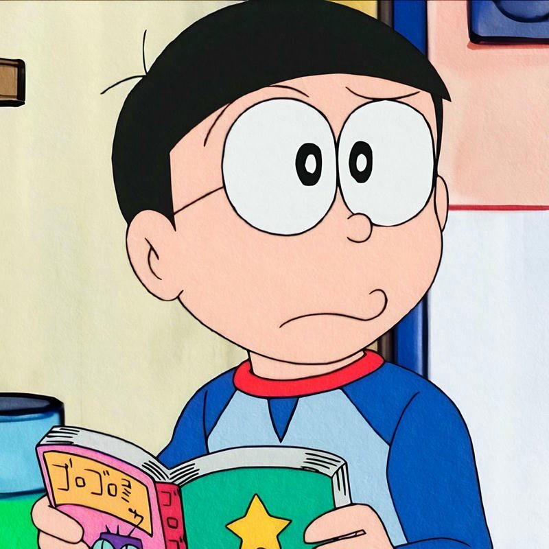 Ảnh Nobita chăm chú đọc truyện tranh rất say sưa