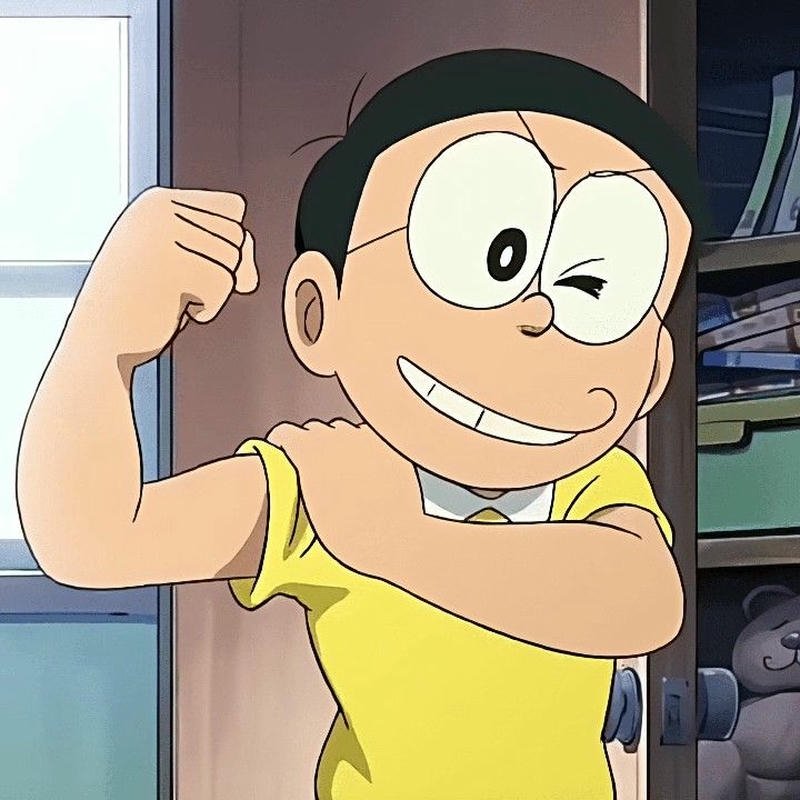 Ảnh Nobita gồng tay khoe cơ bắp chuột nhắt nhỏ
