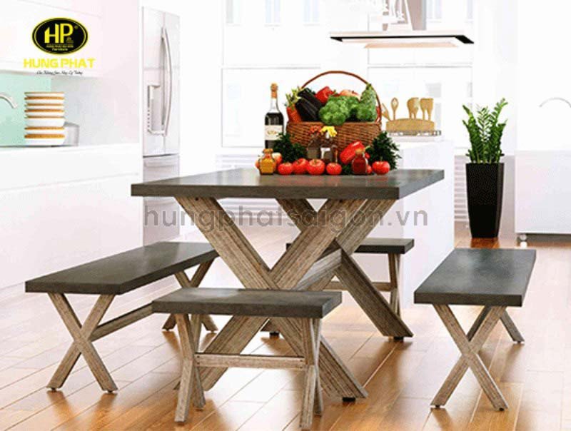 Bàn trà chân gỗ hình chữ X mang đến vẻ đẹp kiến trúc và sự vững chãi.