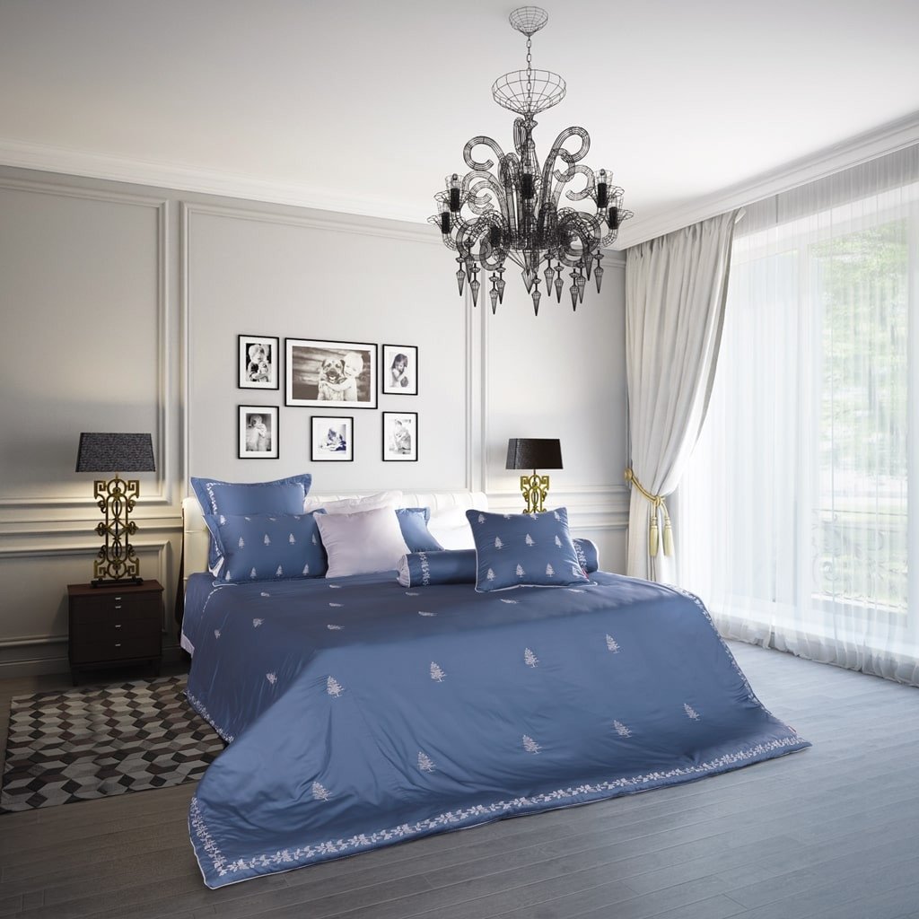 Bộ chăn ga gối màu xanh dương với họa tiết cây thông