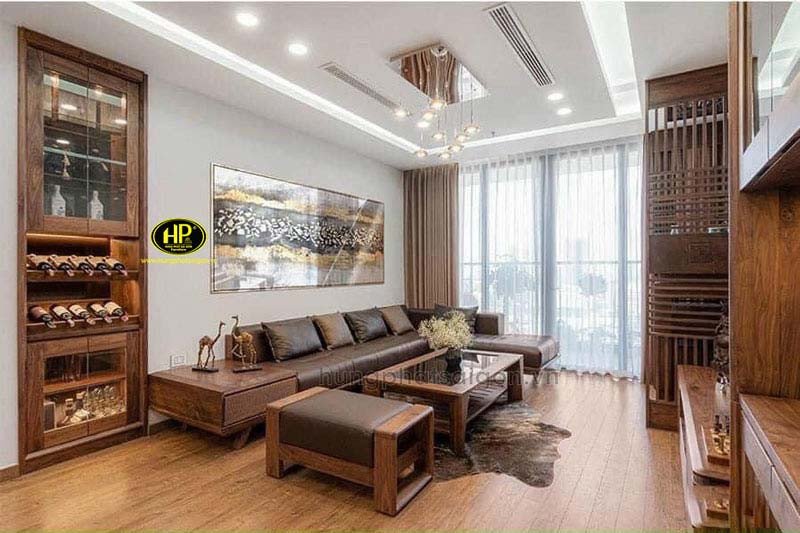 Không gian phòng khách ấm cúng với sofa gỗ óc chó chữ L