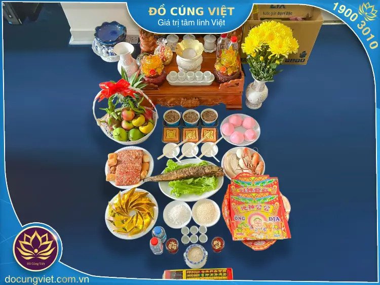 Mâm cúng Ông Thần Tài và Thổ Địa với đa dạng lễ vật, thể hiện sự chu đáo của gia chủ