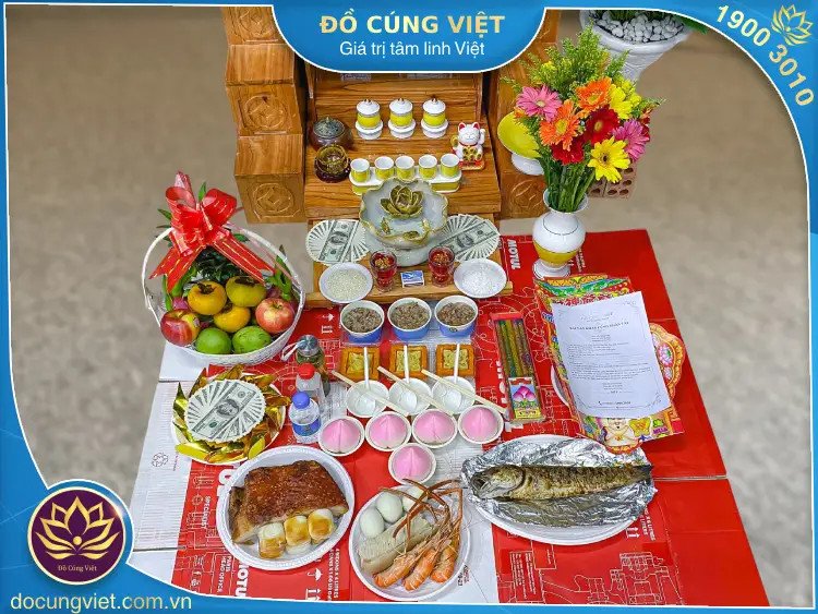 Mâm lễ vật cúng Ông Thần Tài và Ông Địa được sắp xếp tươm tất, cầu mong may mắn