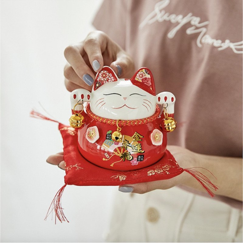 Nên đặt mèo thần tài theo hướng Đông, Đông Nam hoặc theo cung tài lộc