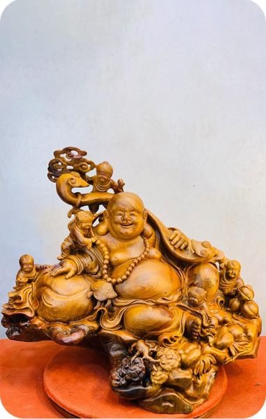 Tượng Phật Di Lặc bằng gỗ sung đẹp tinh xảo thể hiện ý nghĩa sung túc, may mắn