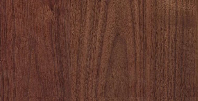 Vân gỗ cuộn xoáy đặc trưng của gỗ Óc Chó, thường dùng làm đồ nội thất cao cấp