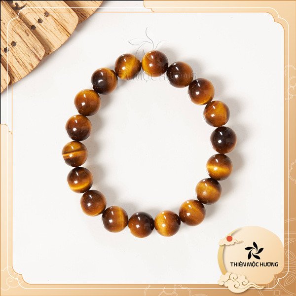 Vòng tay đá mắt hổ vàng cho người nam sinh năm 1963